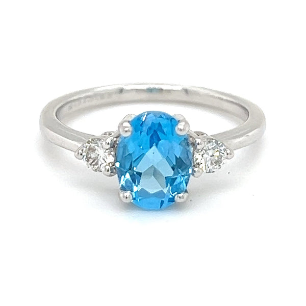 Diamond ring with hot sale blue diamond accents